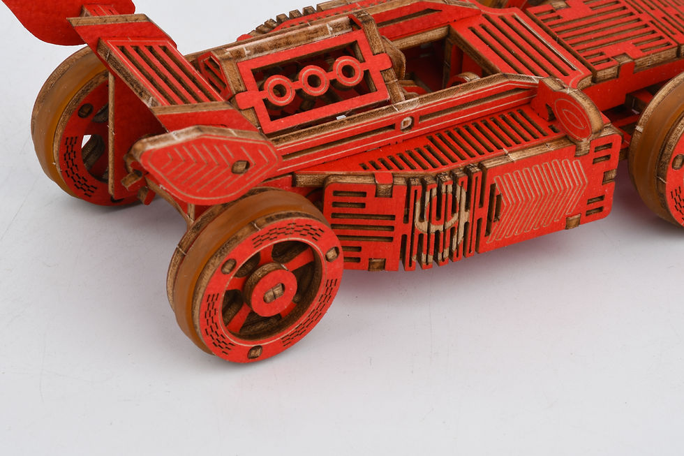 Thumbnail: Close-up of Red 3D Wooden F1 Race Car Puzzle.  Detailed view showcasing the texture of the wood and intricate design.