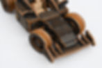 Connecting the Pieces: Close-up of the 3D Wooden F1 Race Car Puzzle, demonstrating the satisfying assembly process.