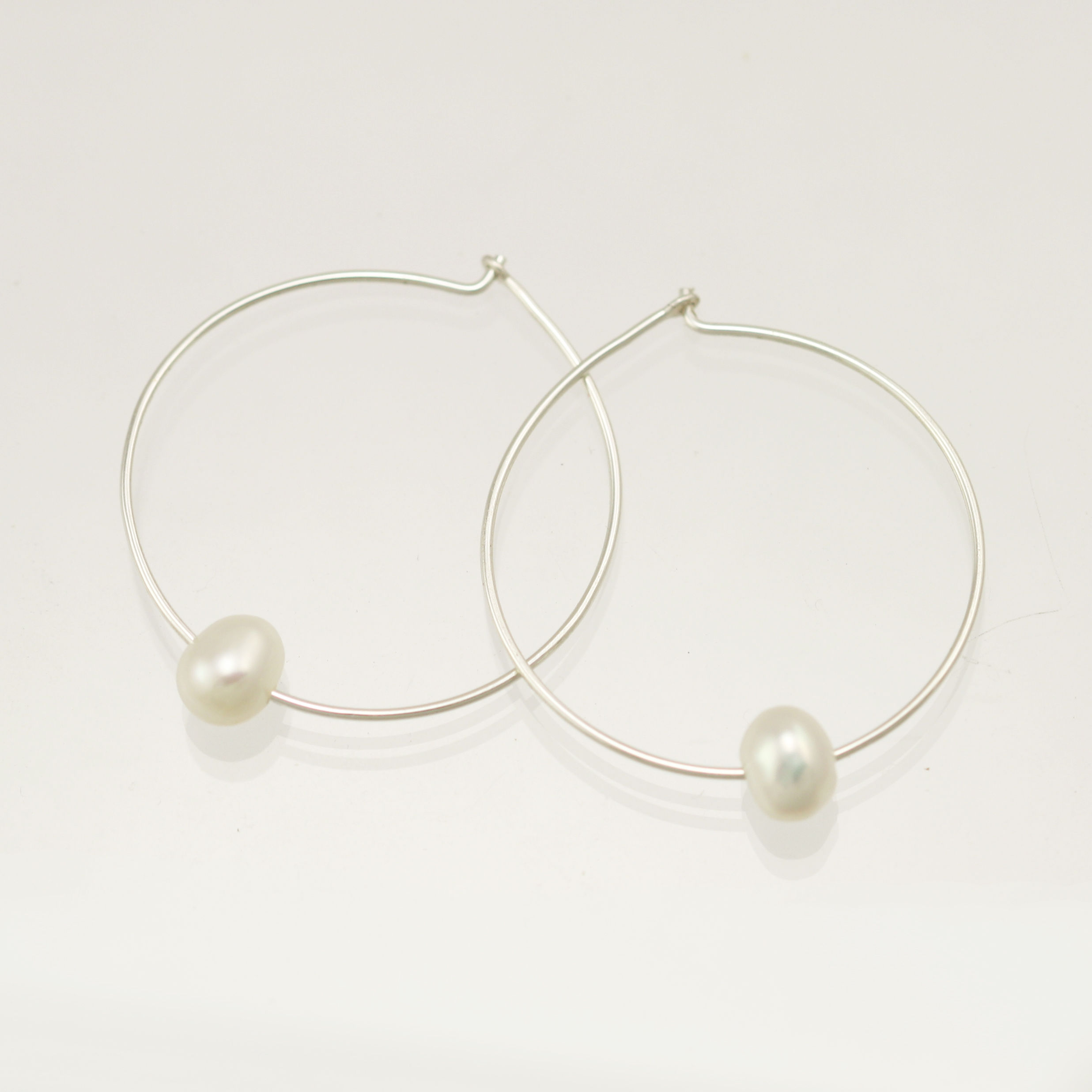 Floating Pearl Hoops in Sterling Silver