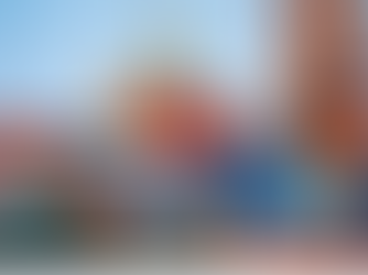 A shipment being picked up by a crane