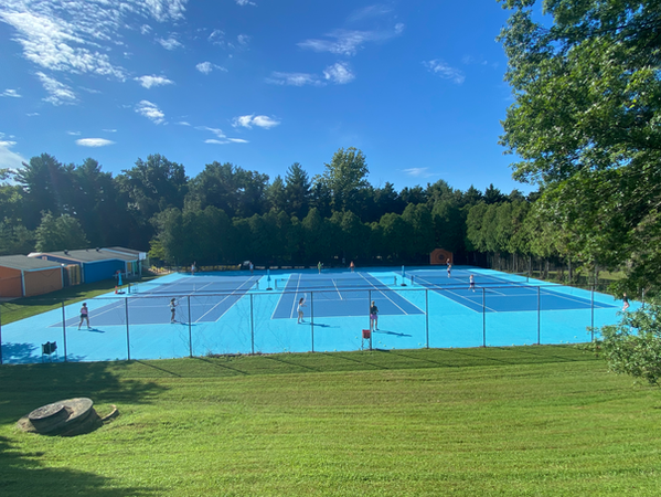 The tennis courts at The Beach Tennis and pool