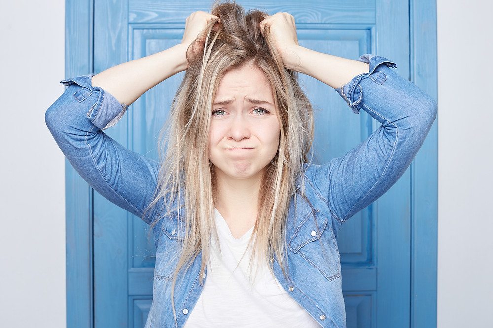 frustrated parent pulling hair by kozie clothes