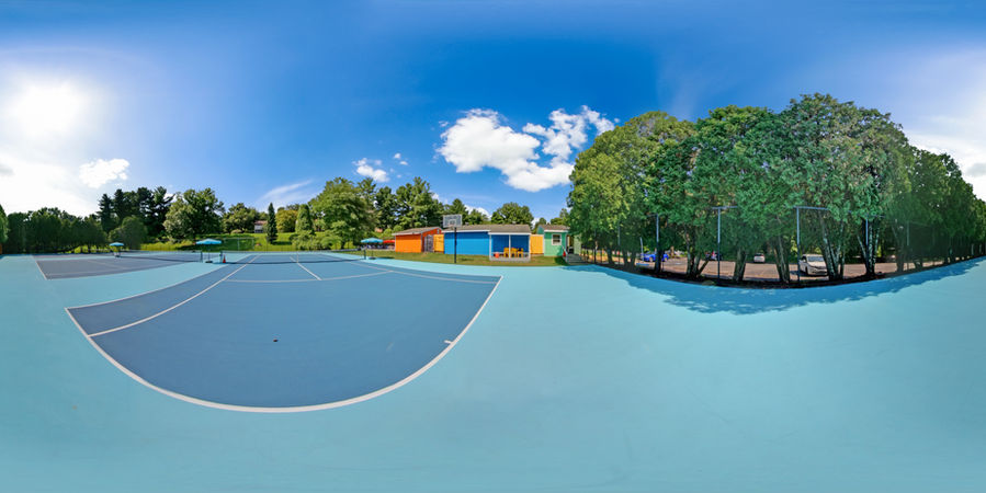 The tennis courts at The Beach Tennis and pool