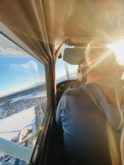 Airplane flight training in Caldwell, Idaho, in February. Student pilot visible.