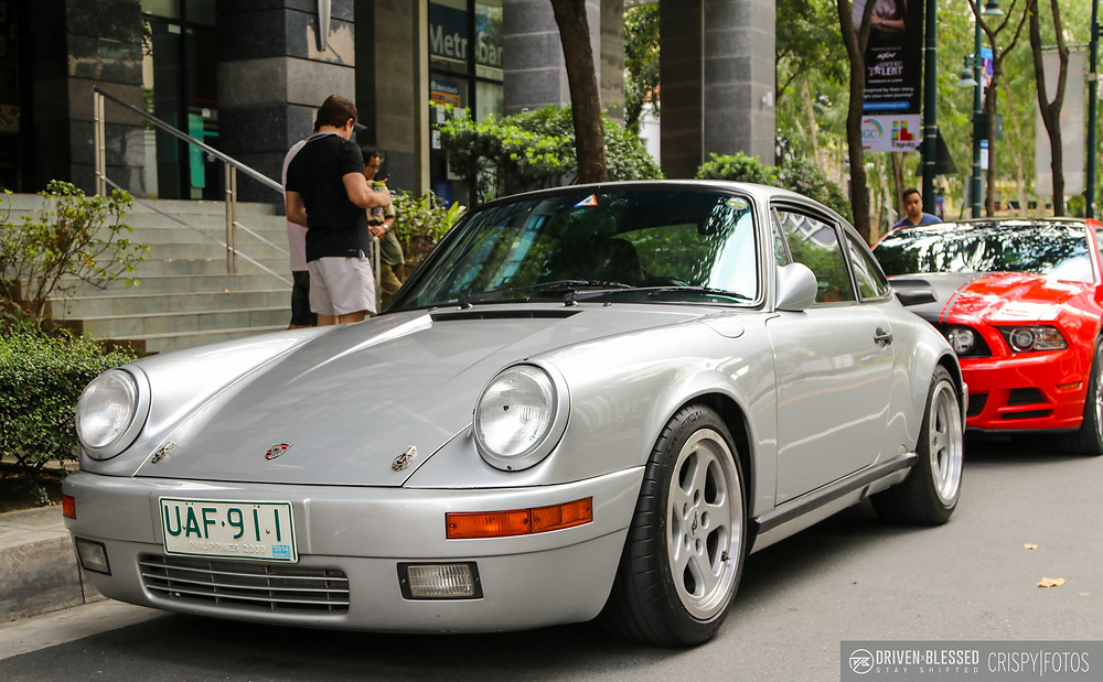 Porsche 911 silver front driver side profile