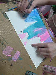 child's hands drawing