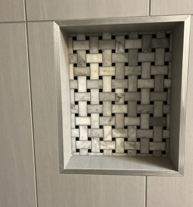 tile shower niche Phoenix AZ with basketweave tile inlay detail