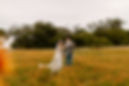 bride and groom in Texas wildflowers Snyder ranch Austin Texas