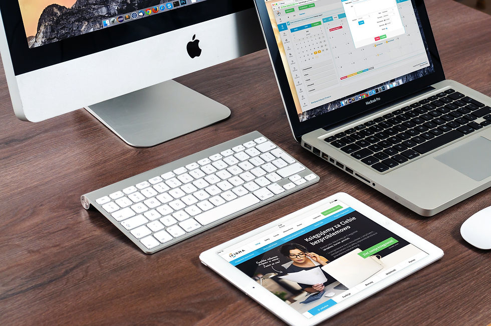 different technology including a Mac PC, laptop and tablet