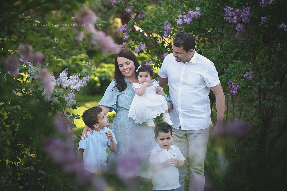 Spring family photography session among the purple lilacs
