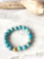 Blue imperial jasper stretchy bracelet with a gold coloured centre bead - handmade