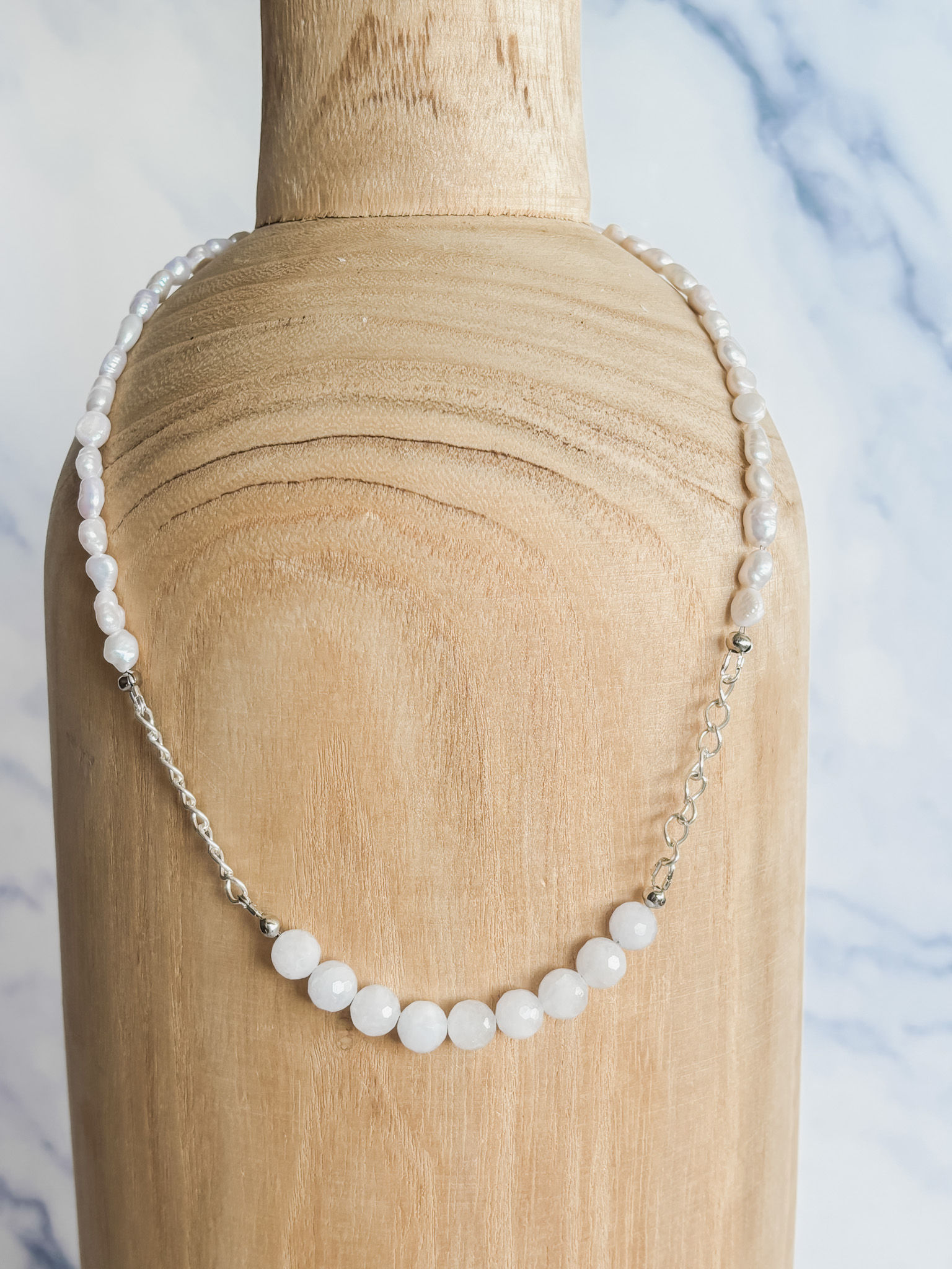 pearl, chain and aquamarine necklace