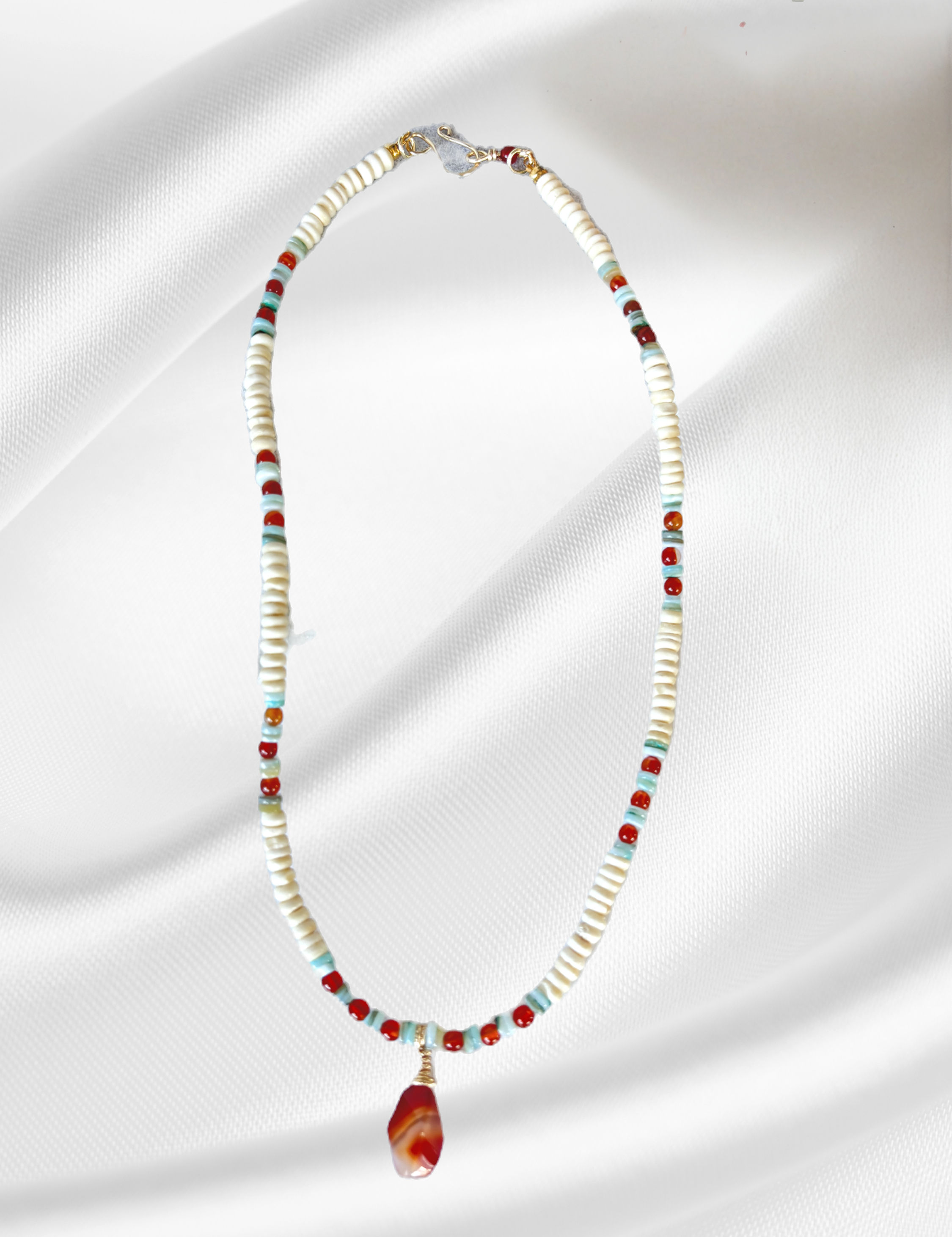 necklace with carnelian and shell on silk