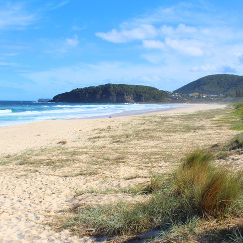 Boomerang Beach with Hills in the background