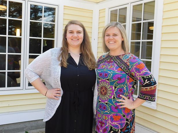 Image of Mary Marchesani and Maddie Mercier posing outside of the Bernon Music Center.