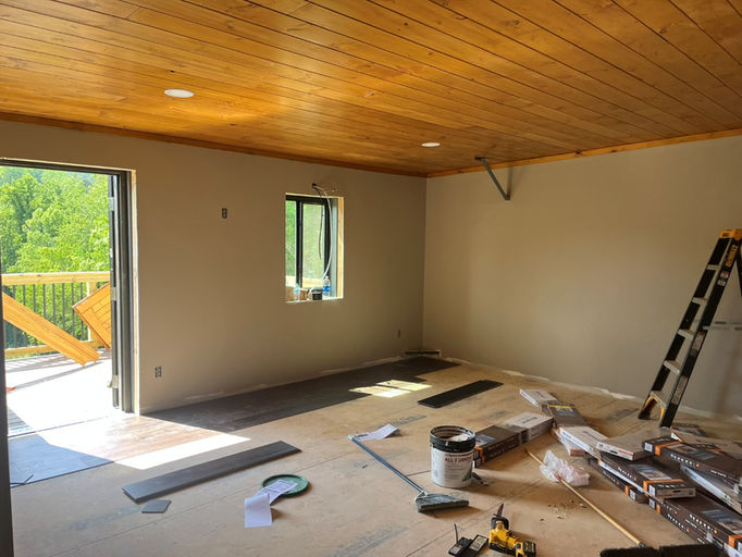 Model unit progress with dry wall and finished ceilings