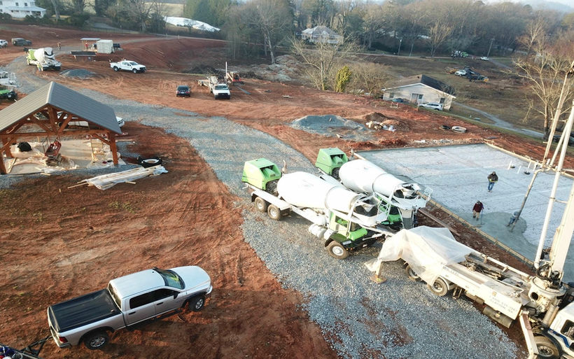 In January, the concrete was poured for the first building at Toy Barn of Dillard, marking a major milestone in bringing the first luxury garage suites to life.
Anchored by the pavilion that will serve as a future gathering space for owners, the community is steadily taking shape.