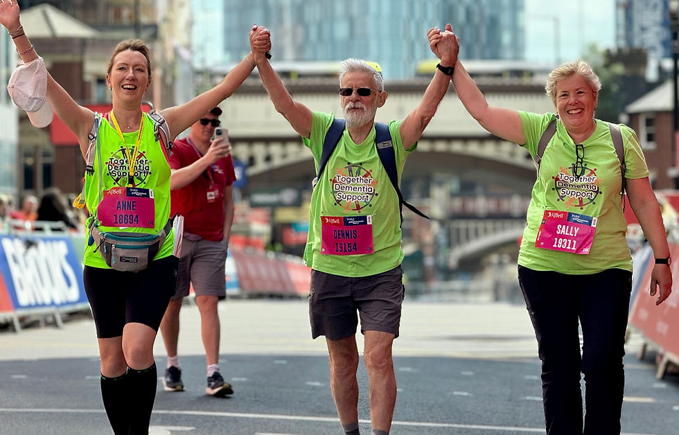 Staff members, Anne and Sally, with our member, Dennis completing the 10K in 2025