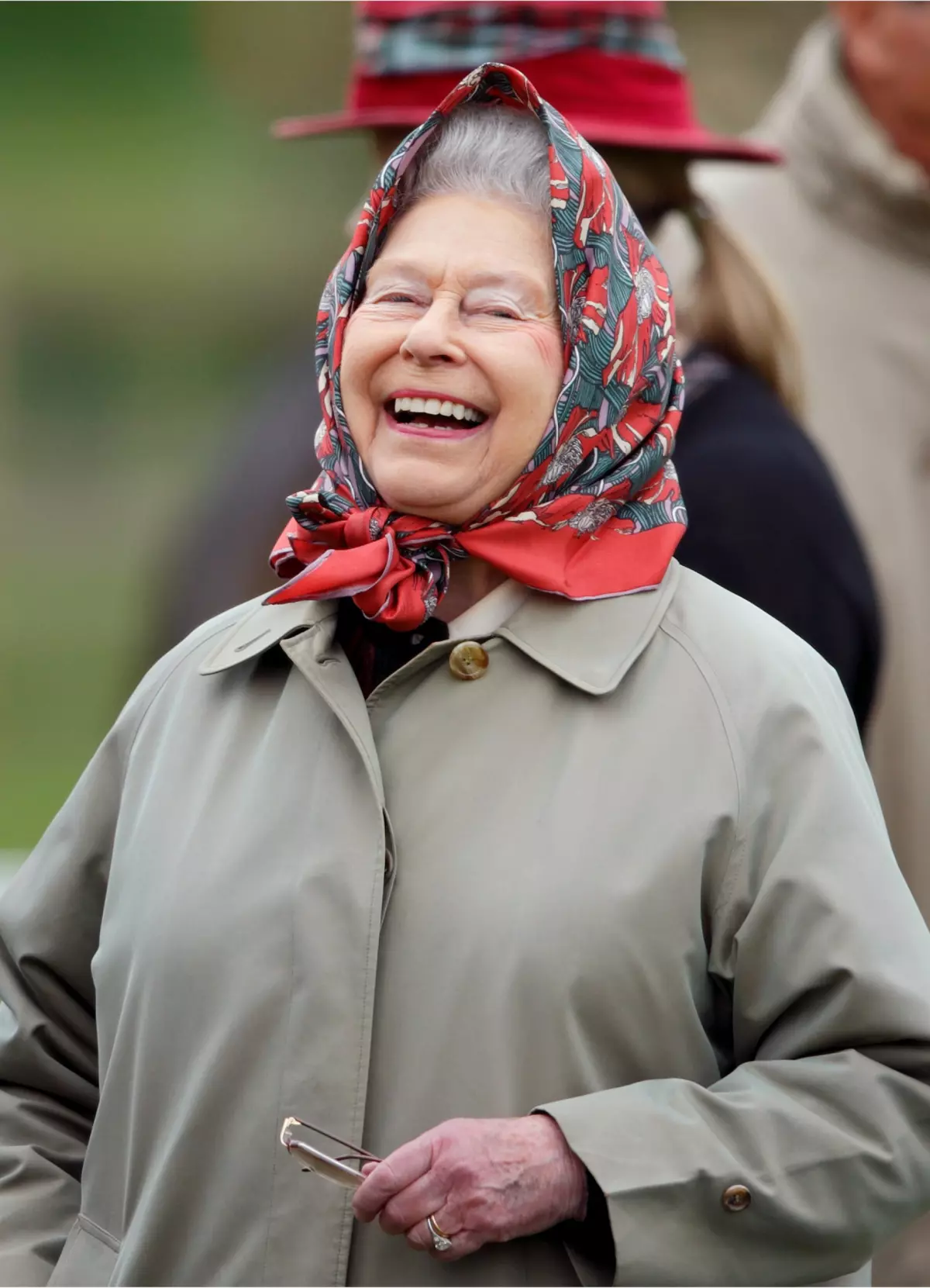 Queen Elizabeth II wearing head scarf