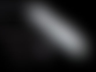 White handheld device with textured grip and three glass attachments on a black background. No text or people are present.