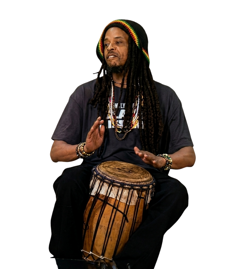 Member of Gullah Land Network playing a djembe drum.