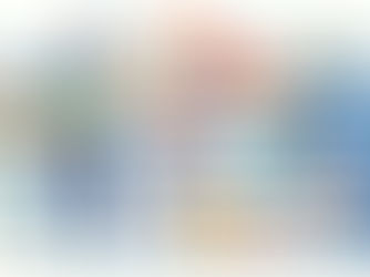 Man smiling in a store, organizing colorful boxes on shelves. Shopping cart nearby. Background with jars and potted plants.