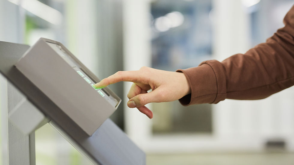 Main image displaying fingerprint scanner and RFID badge reader at a modern office entrance