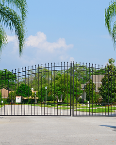 Smart gate installed in a backyard entrance