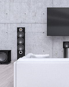 Home theater with wall-mounted display and full speaker system