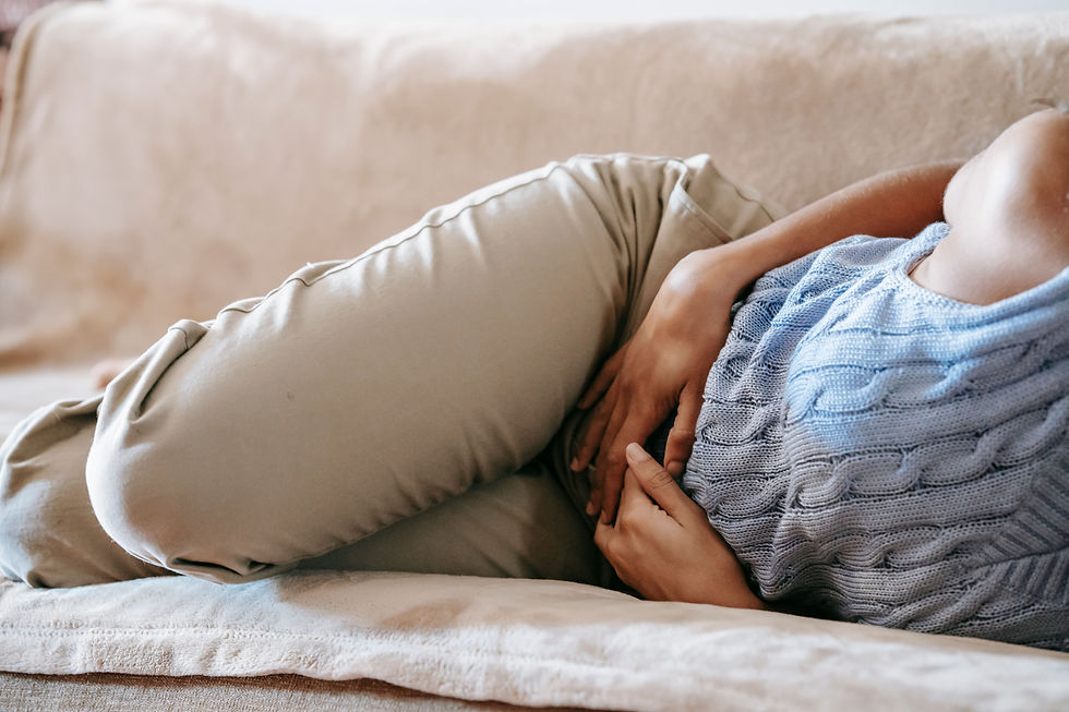 a woman with gut problems