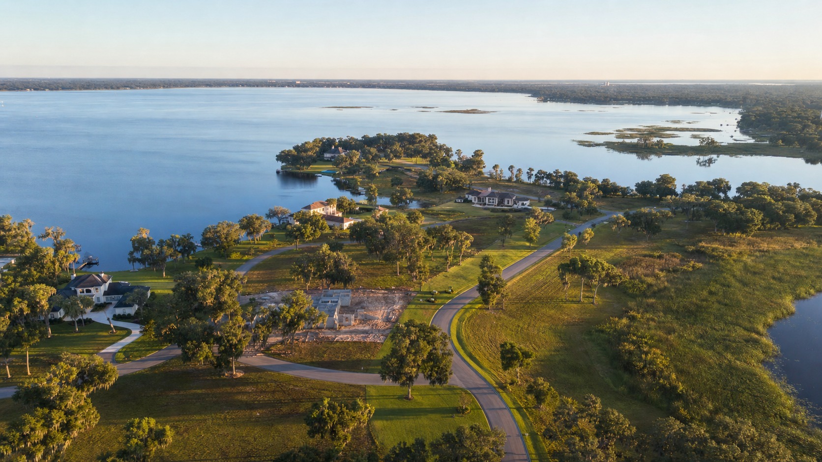 Aerial view of Bellaviva by Highland Homes on Lake Mattie in Auburndale, FL