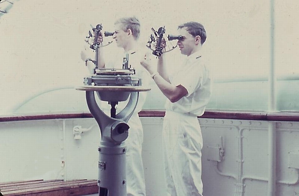 Two ship's officers 'shoot' in one morning with the sextant, the sun altitude (Creative Commons Attribution-Share Alike 4.0 International)