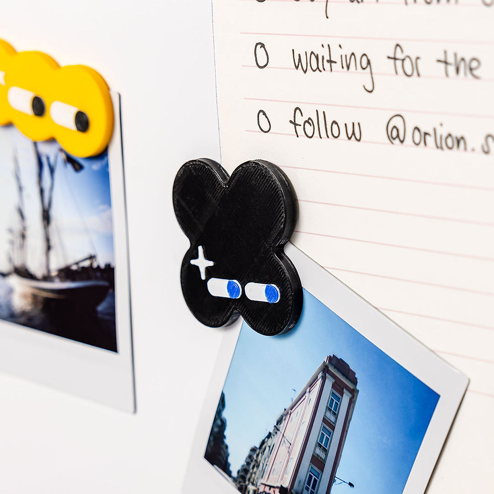 black magnet on the fridge holding a picture, eco friendly magnets for the fridge, office decoration