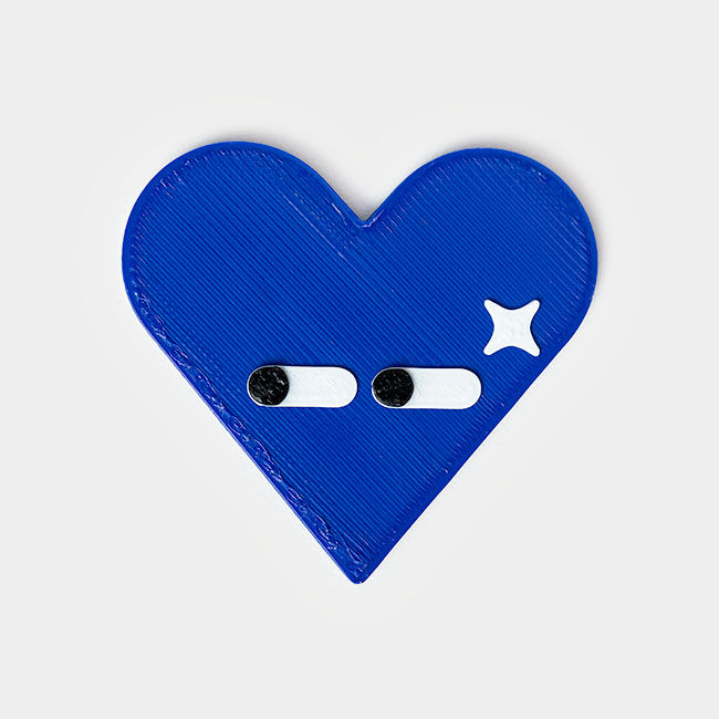 Thumbnail: darkblue 3d printed magnets in an abstract heart shape with simple eye design,eco friendly magnet for the fridge, office deco