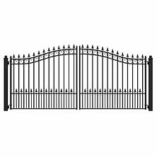 Ornamental iron driveway gate with arched top and vertical pickets – Jacksonville FL gate installation