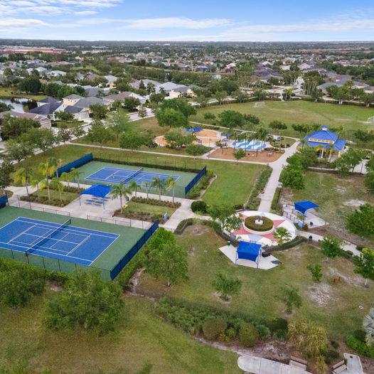 Areial Shot of Centeal park in Bradenton, Lakewood Ranch Floridia. highlighting pickleball courts, green spaces, walking trainls adn community park amenities.