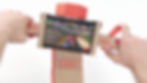 A picture of the bike Toy-Con from the Labo being used to play Mario Kart 8