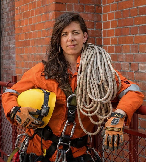 Female worker in protective gear