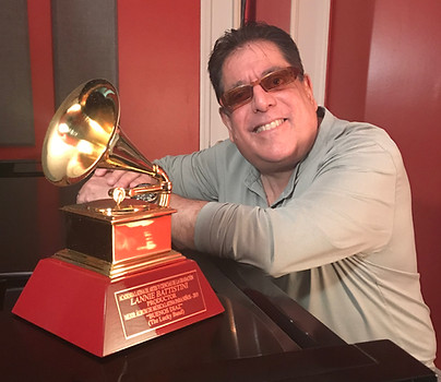 Lannie Battistini with Grammy award trophy