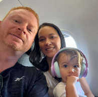 Stephen Gensel, Daniela, and their daughter Julia enjoying a family trip together.