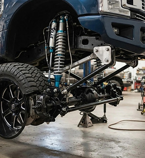 i want a truck with a lift kit show only the bottom lift kit portion of the truck.jpg
