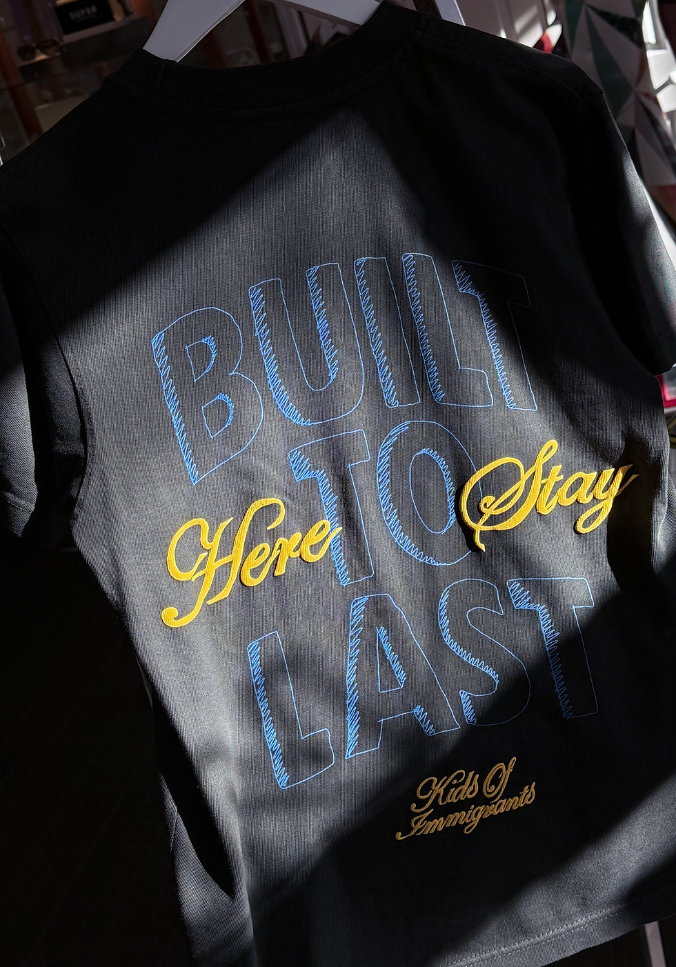 Thumbnail: Kids of Immigrants Here to Stay Tee | black