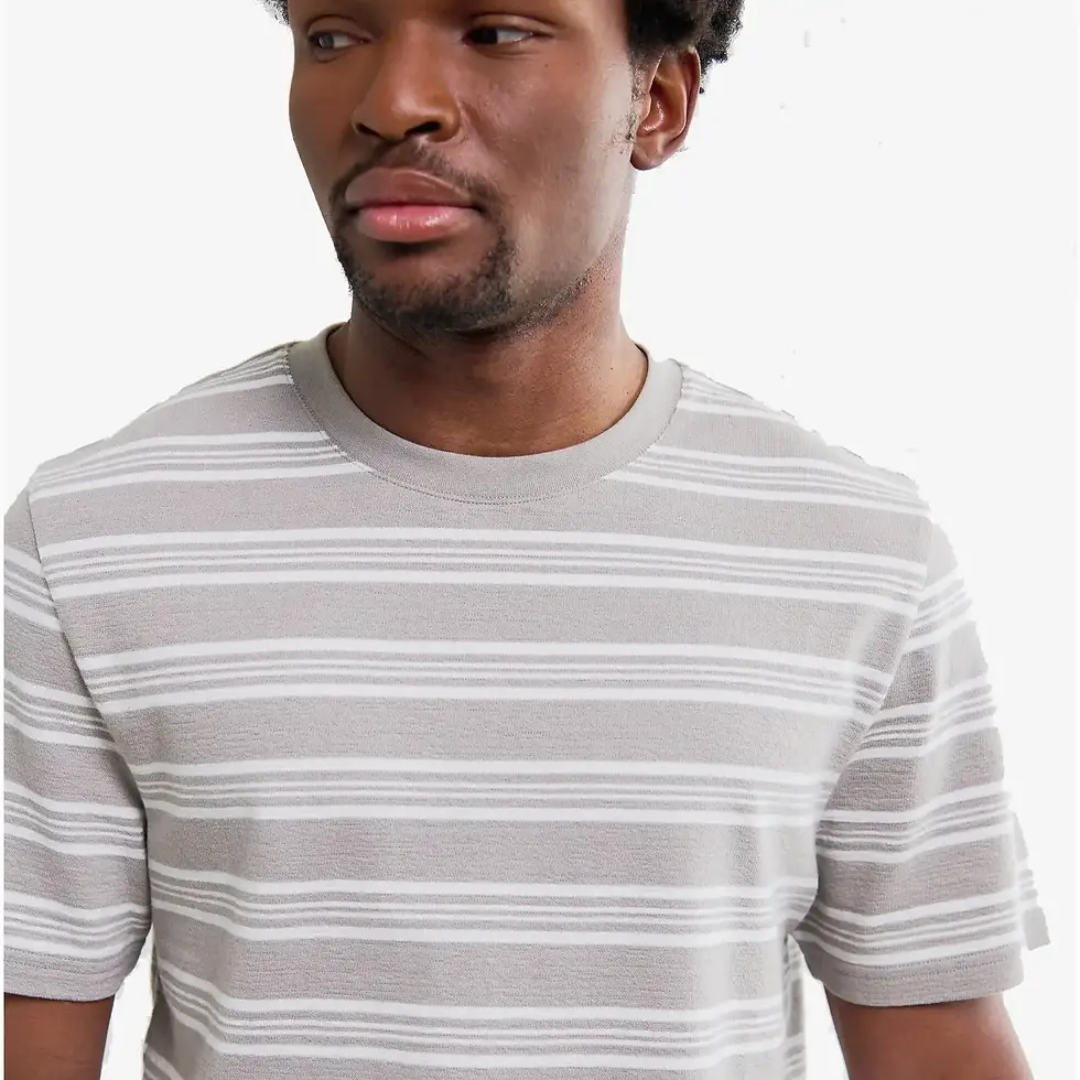 Male model wearing Wax London Dean Stripe Textured Knit T-Shirt in taupe, ecru facing front pose
