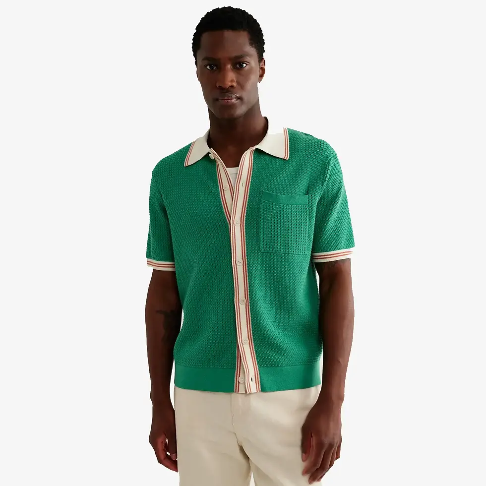 Thumbnail: Male model wearing the Wax London Belle Green Tipped Pointelle Polo Shirt in green and ecru