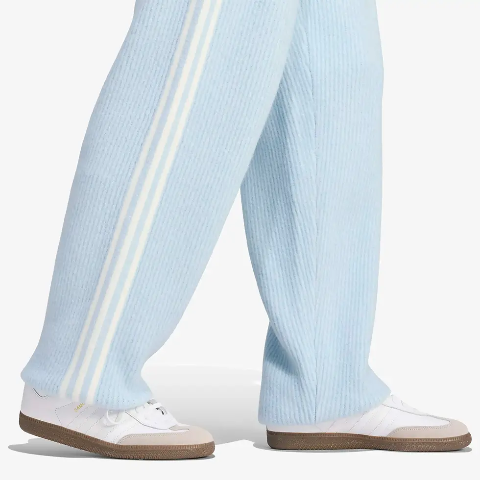 Thumbnail: adidas Originals by Jennie Women's Knit Loose Pants in won blue bottom hem over pair of Sambas
