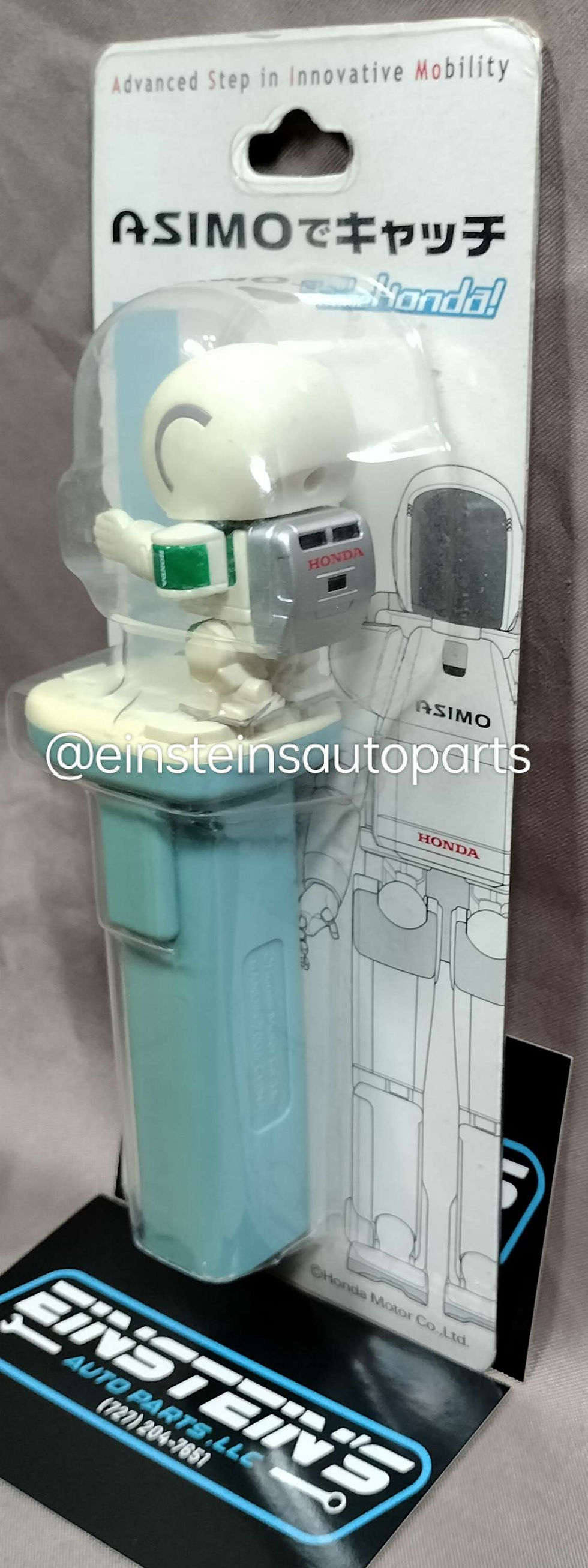 Thumbnail: Honda Asimo Robot candy dispenser in original packaging.