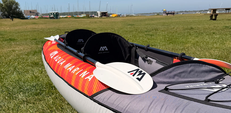 Aqua Marina Memba 390 inflatable kayak close up showing high-back seats, paddle and AquaShell hull construction