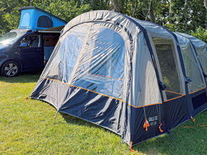 Vango Galli CC II Low drive-away awning pitched next to VW T6 campervan