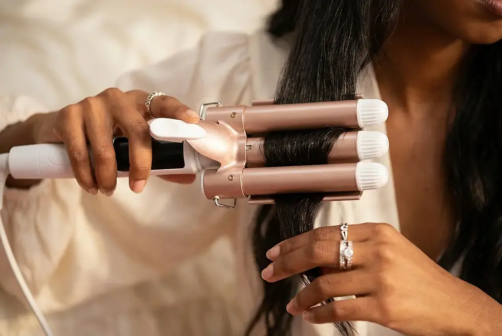 Styling hair with a triple barrel waver for uniform beach waves