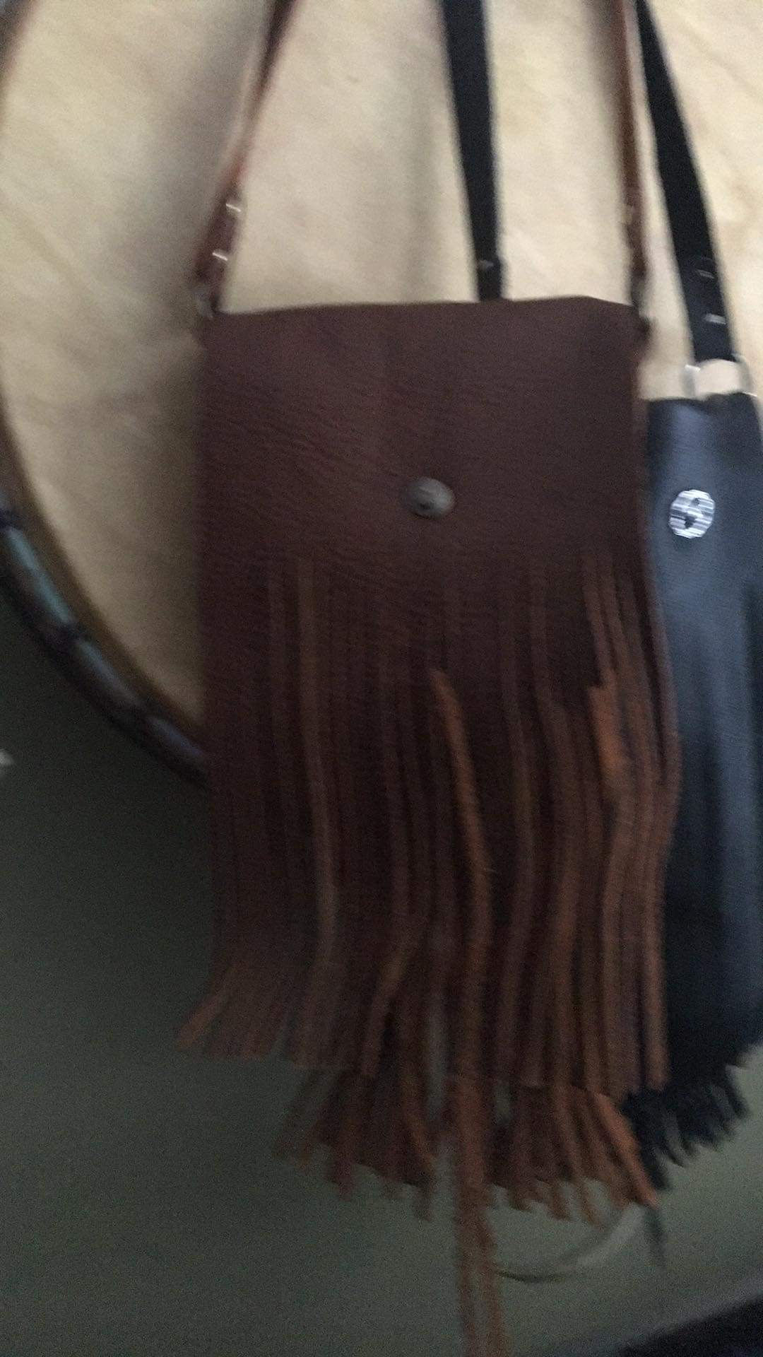 Hand laced leather purses